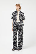 Pantaloni con stampa fragole